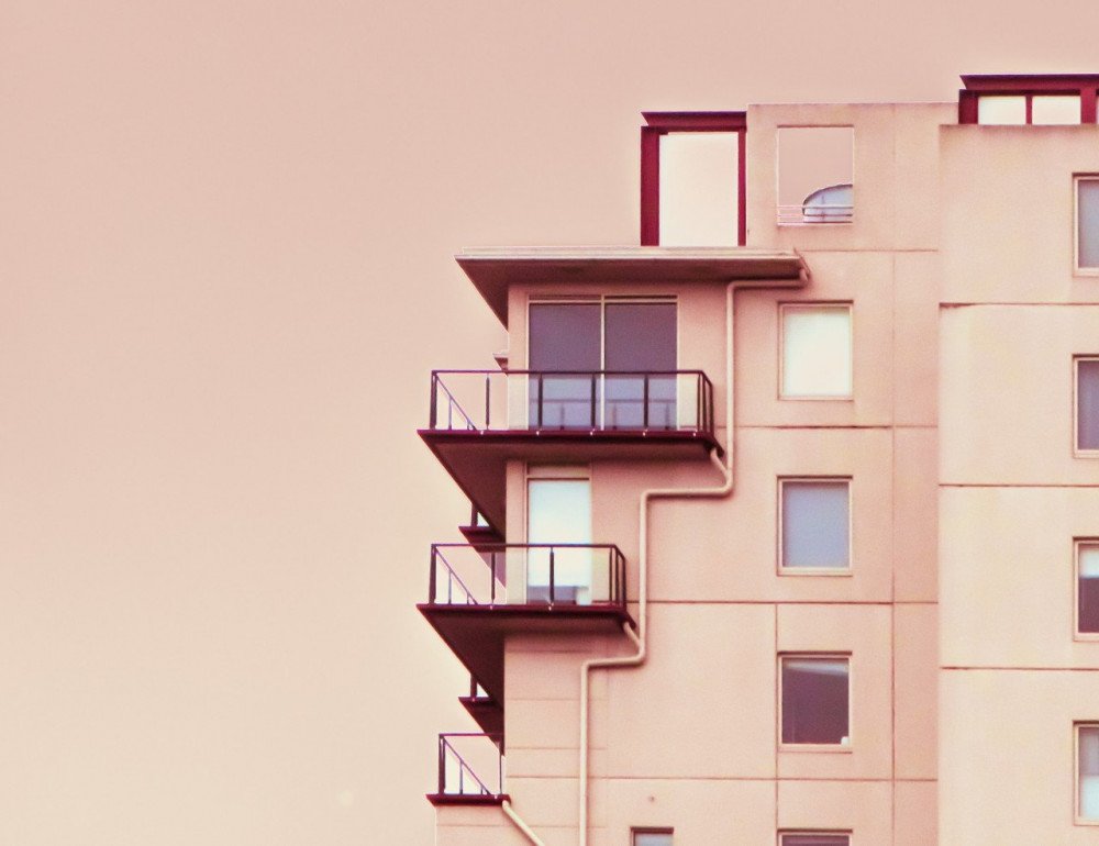 Fastighet med lägenheter – symboliserar fastighetslån